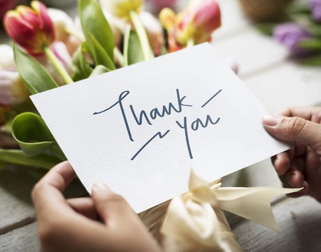 Handwritten thank you card with flowers