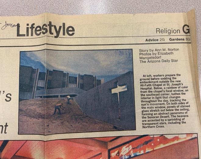 Newspaper article featuring religious building photo
