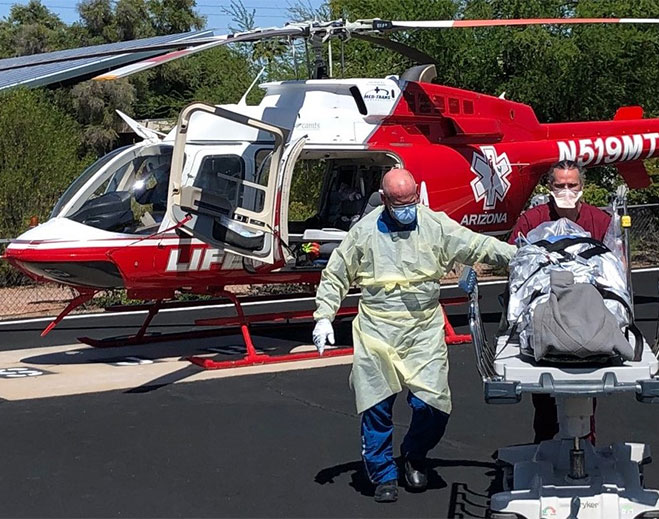Patient transport helicopter with medical team