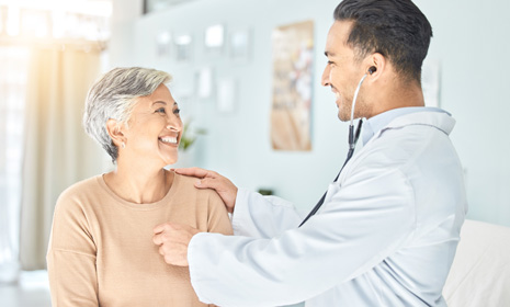 Healthcare professional examining patient’s heart
